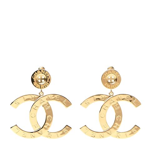 orange and gold button chanel paris earings|Chanel ring earrings.